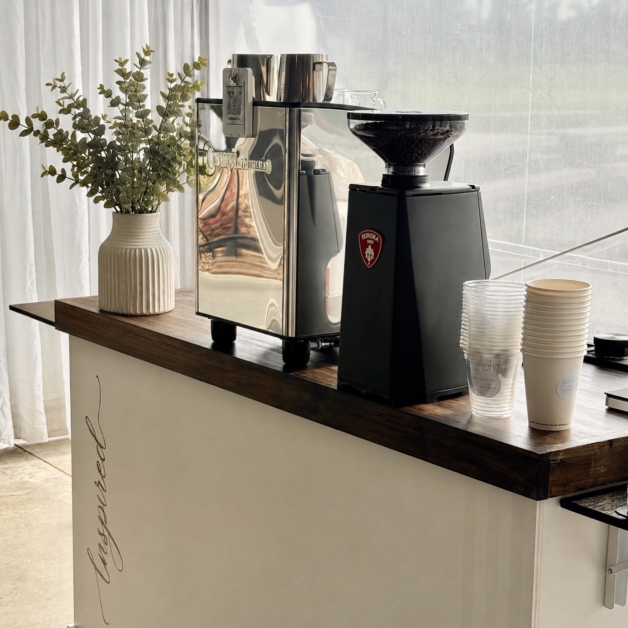 Signature branded cup from Inspired Coffee's mobile Espresso Bar